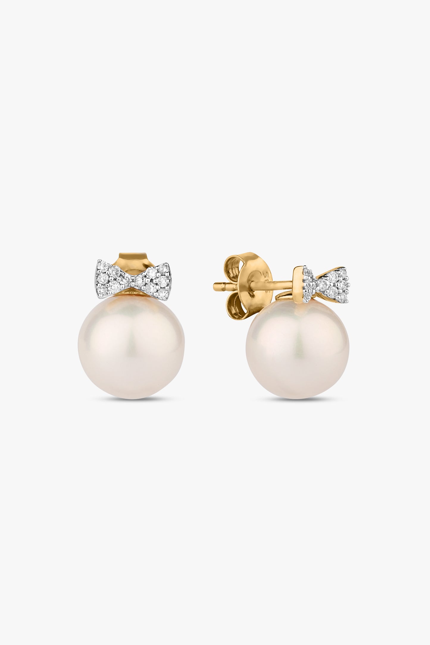 True Decadence faux pearl bow stud earrings in gold | ASOS